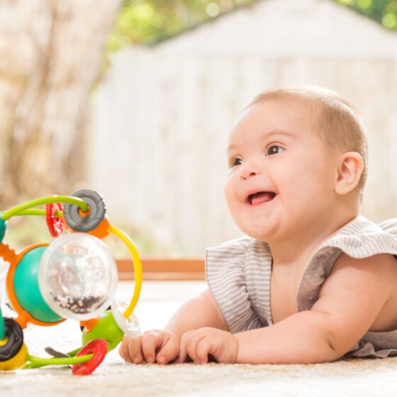 Infantino Activity Ball – Colorful Sensory Baby Ball with Rattle Rings & Rolling Motion - Image 4